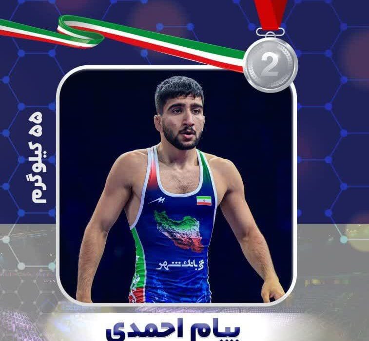 جوان دست فروشی که روی سکوی نائب قهرمانی کشتی فرنگی جهان، حالش خوب نبود!